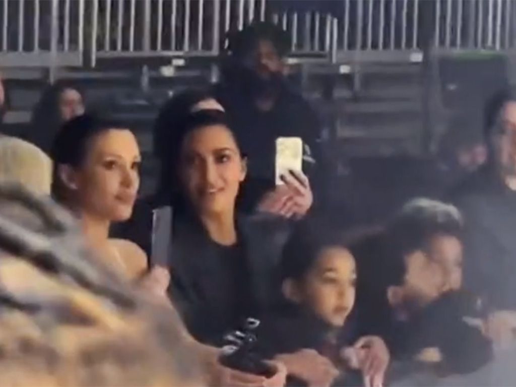 Bianca Censori, Kim Kardashian and two of Kim's children at Ye's album listening party.