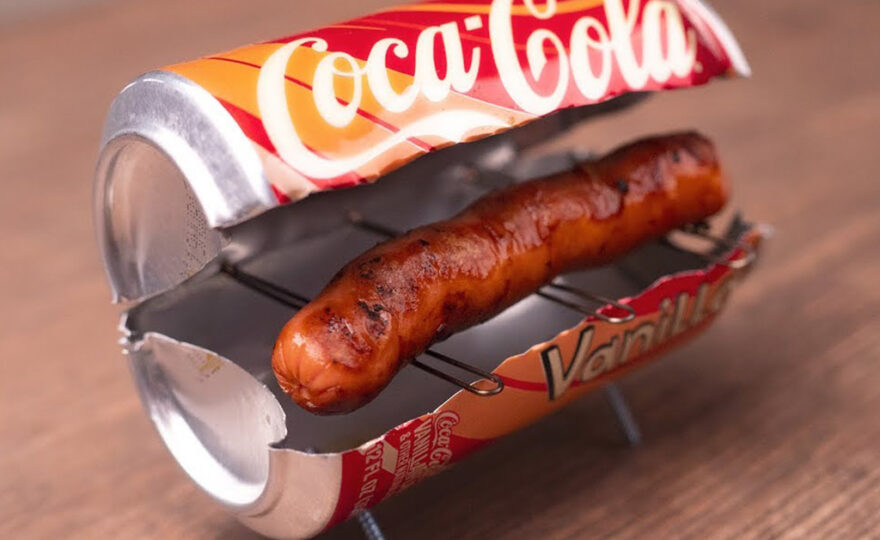 Coca Cola can being used as a makeshift grill