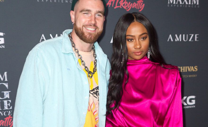 Travis Kelce and Nicole Bailey on a red carpet together