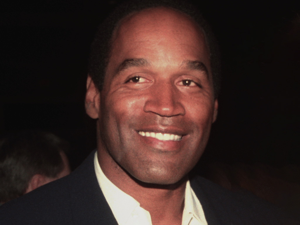 O.J. Simpson leaves Chasen's restaurant.