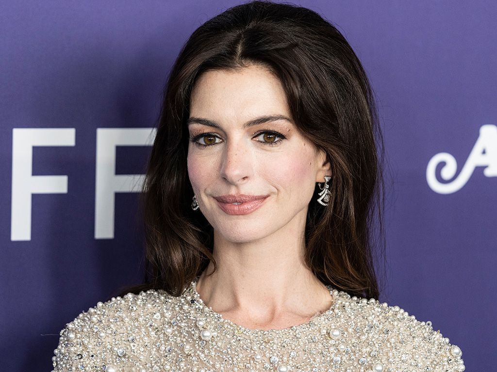 Anne Hathaway wearing dress and shoes by Valentino attends presentation of movie Armageddon Time during 60th New York Film Festival at Alice Tully Hall on October 12, 2022