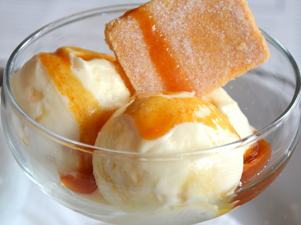 Honeycomb ice cream with honeycomb toffee and hot toffee sauce.