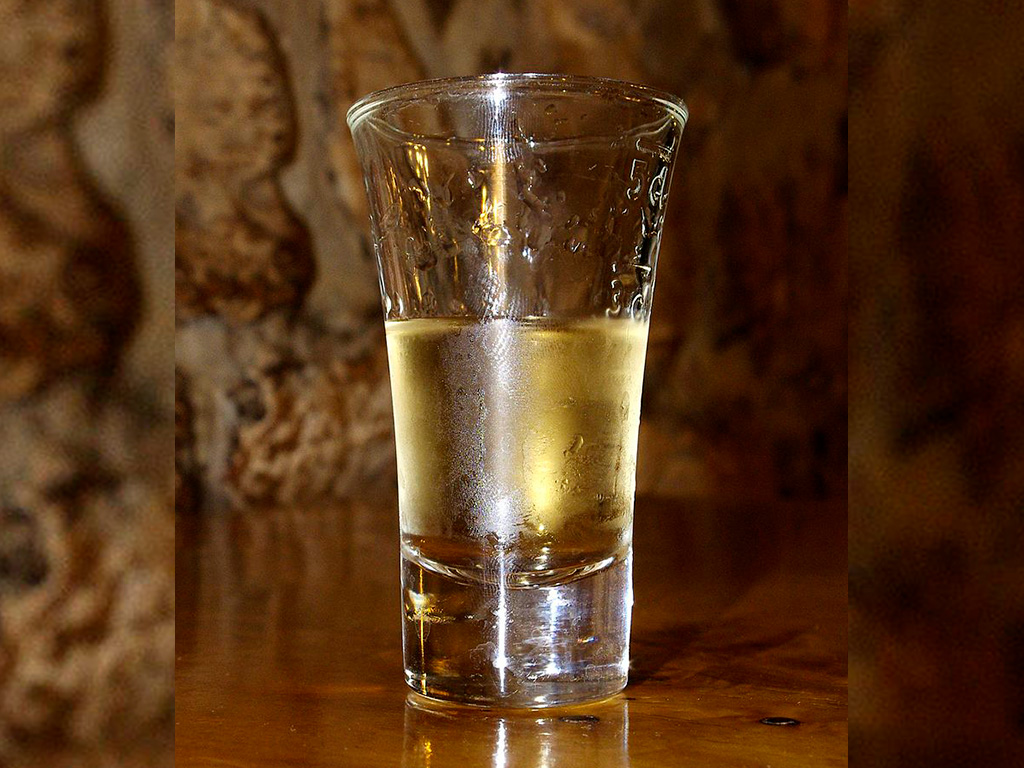 Barack palinka a hungarian apricot brandy, served cold with a glass of mineral water.