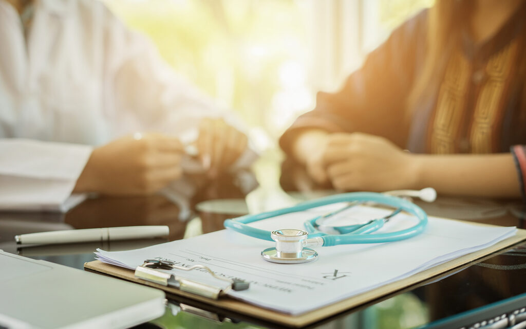 Doctor talking to patient