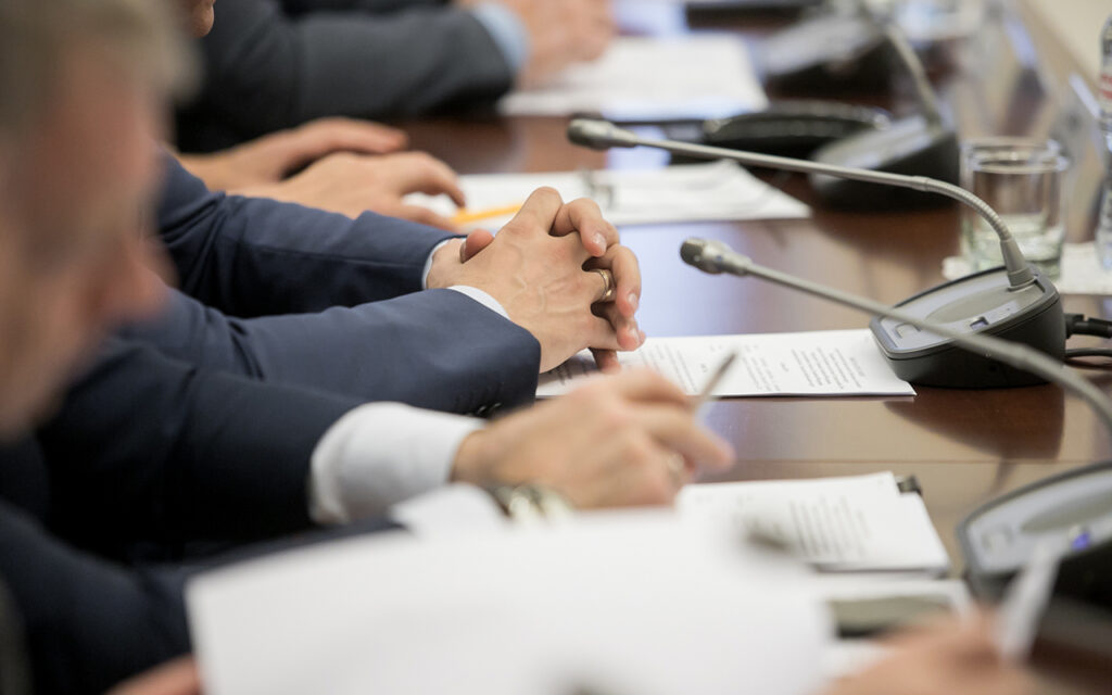 Politicians at a conference table