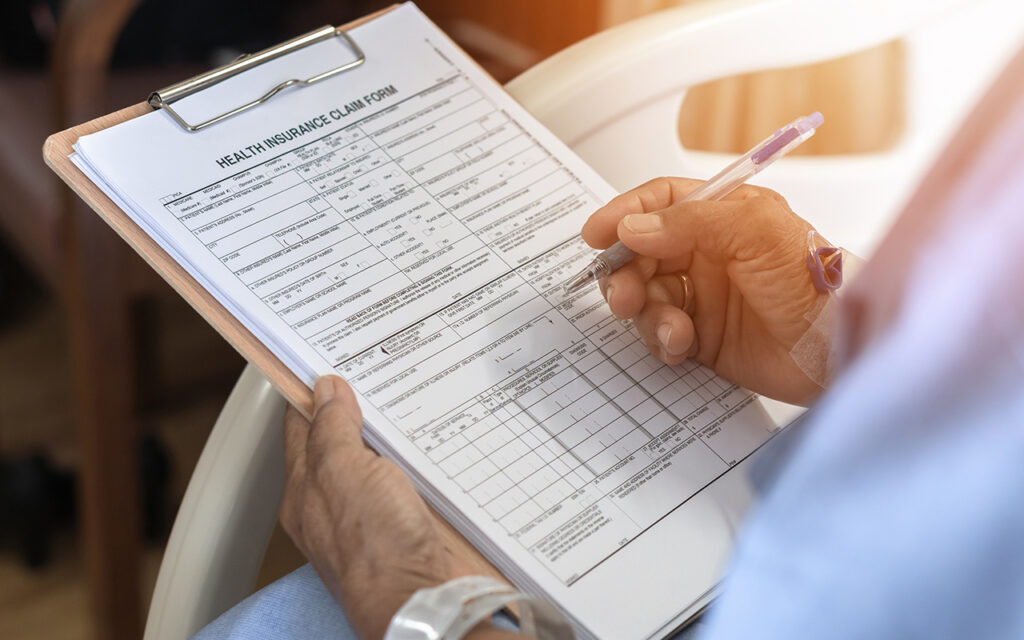 Patient filling out health forms