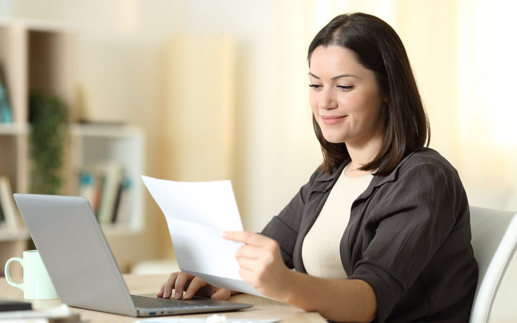 Woman reading paperwork