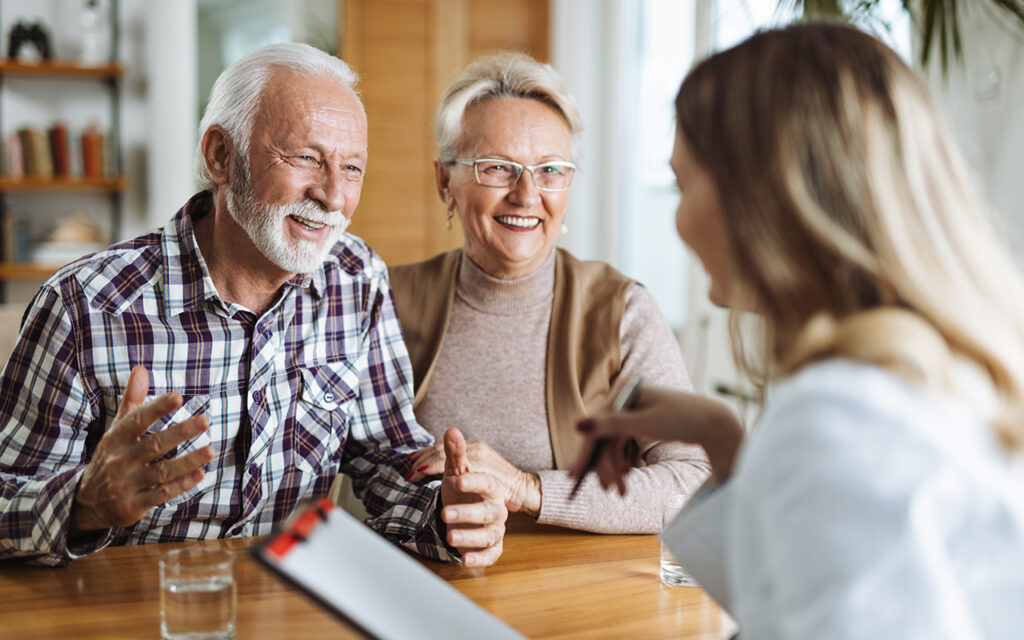 Elderly couple talking to a doctor