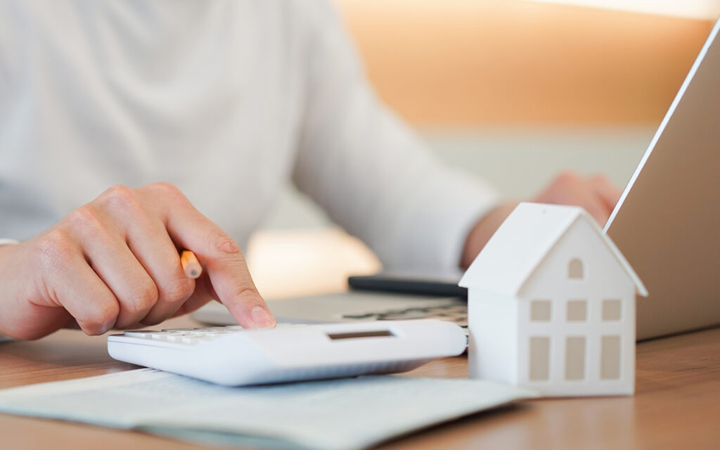 Person calculating their mortgage