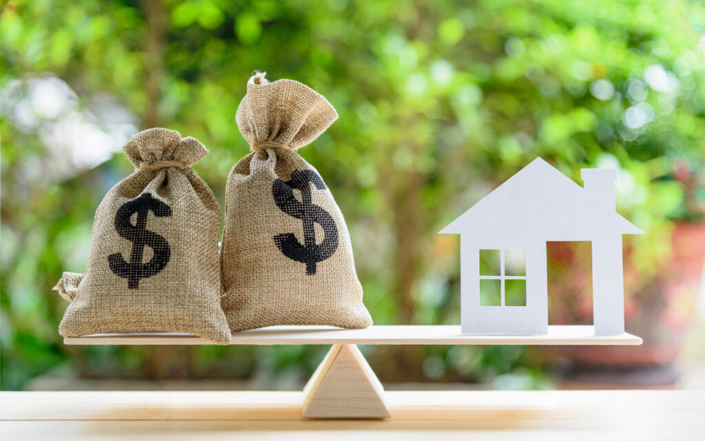 Home and money on two ends of a scale