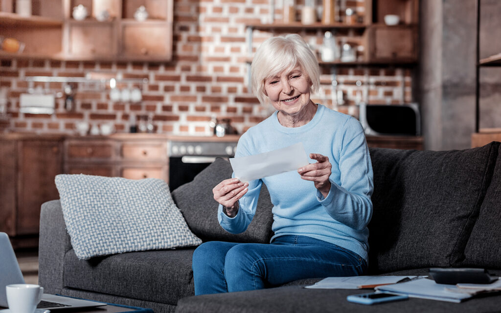 Senior woman checking the mail
