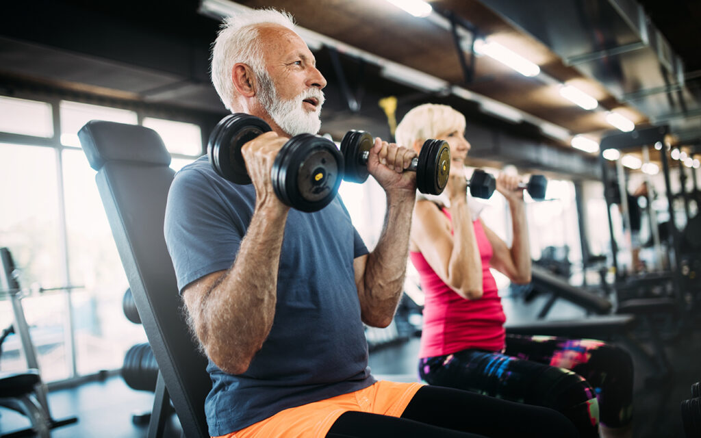 Elderly couple at gym