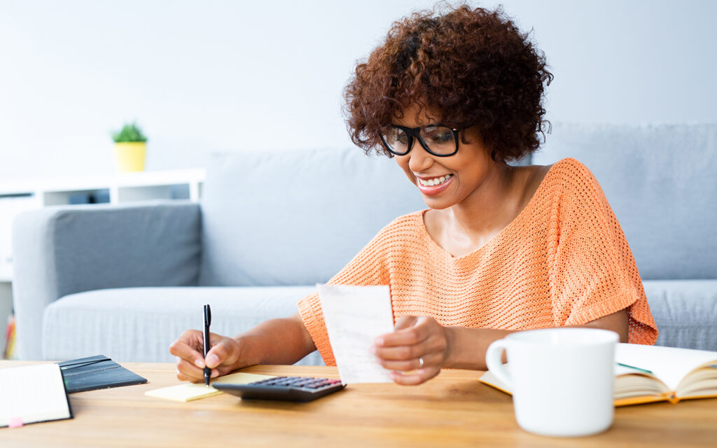 Woman doing financial paperwork