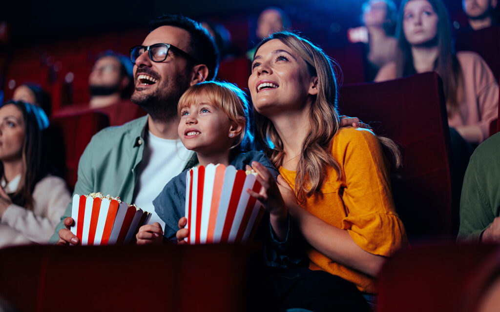 Family at movie theatre